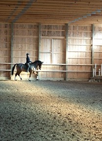 Amy riding in the arena